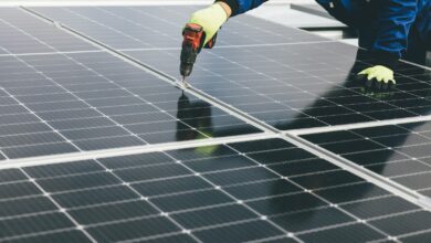 a person working on a solar panel